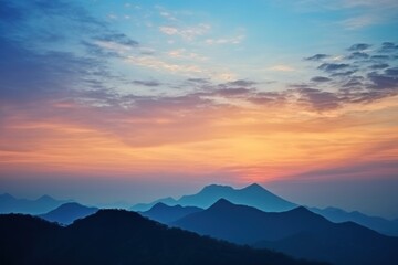 Wall Mural - Mountain silhouette sunset sky landscape.