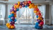 © Jittapon - Colorful and playful balloon in various vibrant shapes and designs creating a festive and joyful ambiance for a in an elegant modern indoor space with large windows and a beautiful chandelier