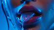 © Екатерина Чумаченко - Close-up of a woman's mouth with a liquid on her tongue against a blue background.
