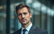 © BlackBird Studio - Serious corporate executive in formal attire