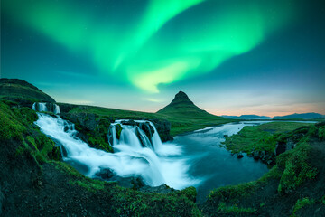 Wall Mural - kirkjufellsfoss waterfall under incredible sky with polar lights. amazing landscape with kirkjufell 