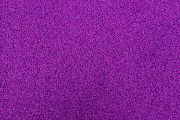 Poster - A vibrant purple surface features a rich texture that draws attention, setting the perfect backdrop for creative projects or design work in any artistic environment