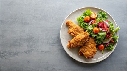 Wall Mural - Minimalist fried chicken dish on plate with side salad