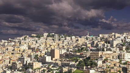 Wall Mural - View of the modern houses Amman, Jordan, Middle East. Against the background of a beautiful sky with clouds. 4K, time lapse, with zoom