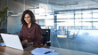 © Stock 4 You - Young businesswoman professional employee using pc doing online banking analysing at workplace. Latin hispanic middle age business woman working on laptop computer in modern office. Banner, copy space