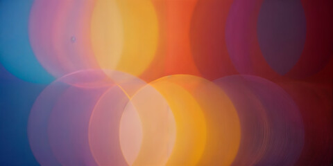 Poster - Colorful circular lights blend together to form an abstract pattern, showcasing vibrant hues in a captivating nighttime display during a celebration