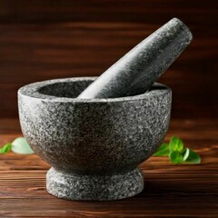 Wall Mural - mortar and pestle with herbs on a wooden background