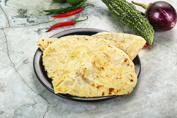 Indian tandori bread - naan with cheese