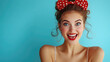 © Synthetica - A woman with red polka dot bow on her head is smiling. She has red lipstick and her eyes are wide open