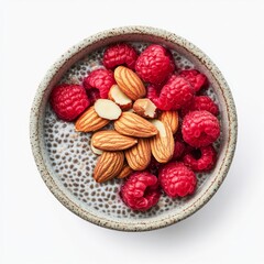 Wall Mural - A vibrant bowl of fresh raspberries and crunchy almonds showcases a healthy snack choice. Ideal for wellness-focused living. Perfect for food photography. AI