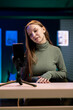 © DC Studio - Smiling young content creator records introductory video with smartphone, inviting viewers to subscribe to channel. Cheerful media star uses mobile phone to film herself connecting with audience