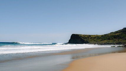 Lilyvale. Coastal View from Palm Jungle Loop Track, Royal National Park. Rugged Cliffs and Blue Ocean Waves Meeting the Rocky Shore. Burnings Palms Area, New South Wales,  Australia