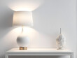 © Nyetock - Night interior with a lamp on a white table. White wall with modern decoration. 3D rendering.
