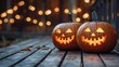 © Pixel Alchemist - Two glowing Halloween pumpkins with carved faces, festive atmosphere.