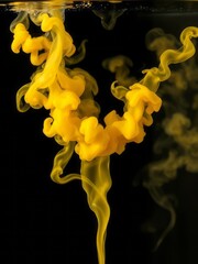 Abstract liquid art yellow smoke bomb on black background amber color acrylic paints under water Smoke Explosion Backdrop