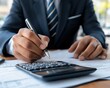 © Ai-Pixel - Professional hand calculations in office setting.