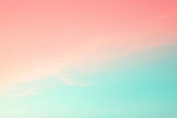 Wall Mural - A serene gradient of pastel pink and teal colors blending harmoniously in the sky, perfect for calming backgrounds or designs.