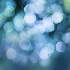 Wall Mural - A soothing abstract background featuring soft blue bokeh lights, perfect for enhancing various creative projects.