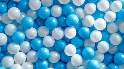 White and blue plastic balls selected for a ball pit