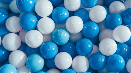 White and blue plastic balls selected for a ball pit