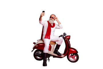 Wall Mural - Portrait of his he nice attractive stylish trendy confident content cool gray-haired man taking making selfie touching specs isolated over bright vivid shine red background