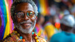 © Bartek - Joyful Mature African American Man Celebrating LGBTQ+ Pride with Rainbow Flags at Summer Parade, Inclusive and Happy Vibes