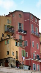 Wall Mural - View of the colourful buildings in Menton, France. Vertical