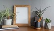 © Rahmat  - Minimalistic home interior with mock up photo frame on the brown wooden table with office accesories, notebooks and tillandsia in design pots. Grey walls. Minimal decor of desk.