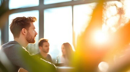 Canvas Print - A group of managers in a relaxed setting discuss performance goals, providing feedback and guidance to employees.