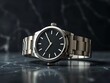 © Jittiwan - A sleek luxury wristwatch with silver band and black dial on dark marble background, product photography for advertisement