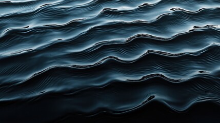 Canvas Print - Abstract close-up image of dark water surface with gentle waves creating a rippled texture and pattern.