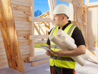 Poster - man architect. builder with papers in hands. architect inside wooden house under construction. man d