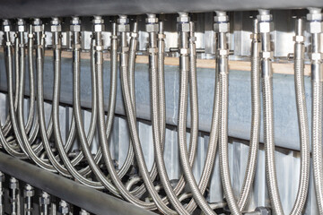 Poster - industrial equipment. high pressure metal pipe. steel hoses on industrial equipment. machine for sup