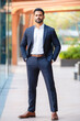 © PRASANNAPIX - young indian business man standing confidently at outdoor