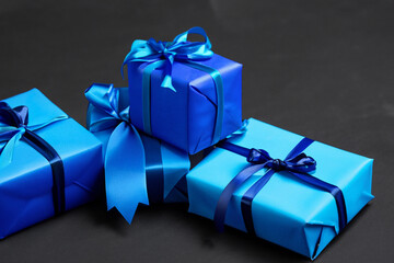 Gifts in blue and on. design holiday white concept. a box of gifts in blue on a . a box of gifts in blue and on lifestyle a.