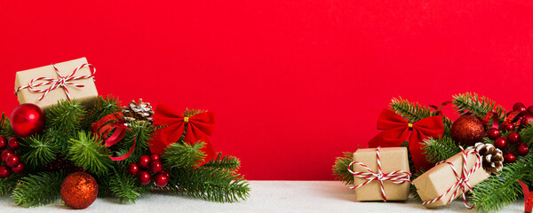 Wall Mural - New Year Christmas tree toy, branches of a christmas tree, New Year decorations on a colored background