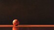 © Jari.art - A basketball sits on a polished wooden floor, illuminated by soft light against a dark background, highlighting its texture and color.