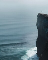 Sticker - Solitary Figure Stands at Cliff s Edge Overlooking Vast Ocean Expanse