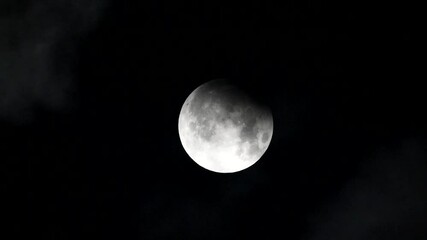 Wall Mural - full moon in the night Partial lunar eclipse Full moon and lunar eclipse Full moon between the clouds Super moon 2024