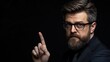 © KN Studio - The Warning: A serious and stern-faced man with a beard and glasses points his index finger directly at the viewer, his expression conveying a sense of caution and urgency.