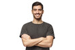 © Damir Khabirov - Smiling handsome young man in gray t-shirt standing with crossed arms