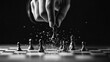 © Wed - Black and white chess scene with hand moving king piece during intense strategy game