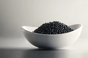 Minimalistic elegance with black caviar in a white modern bowl