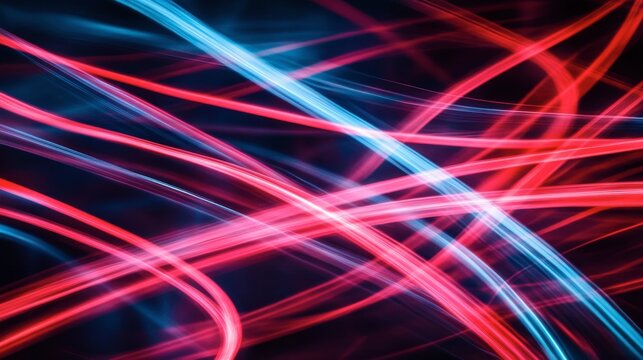 Glowing lines in red and blue crossing each other, forming an abstract light pattern with a sense of motion.