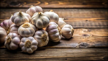 Garlic bulbs arranged on a rustic wooden board , fresh, organic, ingredient, cooking, food, herb, spice, kitchen, wooden