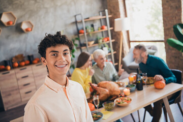 Poster - Photo of young teen grandson smile cheerful family meeting eating thanksgiving holiday dinner good mood having fun home indoors