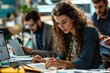 © GoodandEvil - Focused Woman Working on Papers in Office Setting