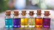 © hardvicore - Small corked glass bottles with colorful liquids.