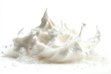 Wall Mural - A close-up shot of fluffy whipped cream on a white surface