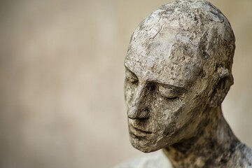 Poster - Close-up view of a statue of a man's face, detailed and realistic